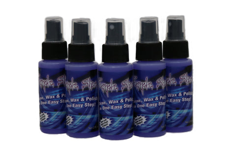 Travel size bottles of purple Slice spray wax